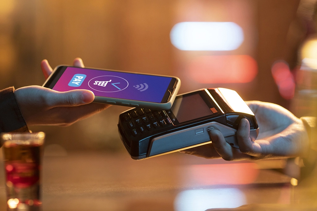 Paiement avec un logiciel de vente et gestion de stock utilisant un terminale de paiement et une fonctionnalité mobile